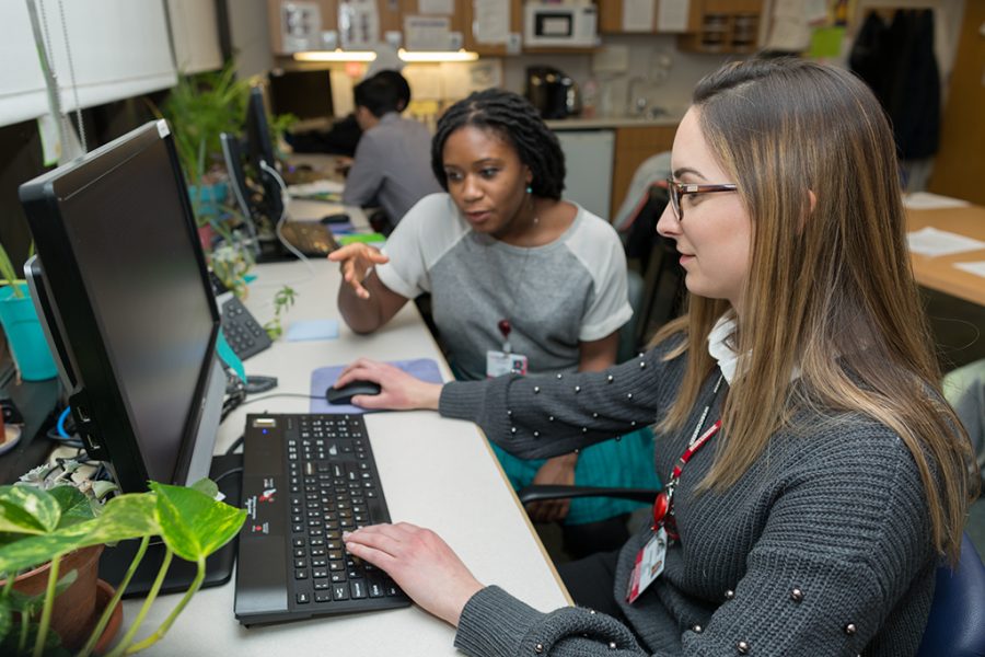 colleagues at computer